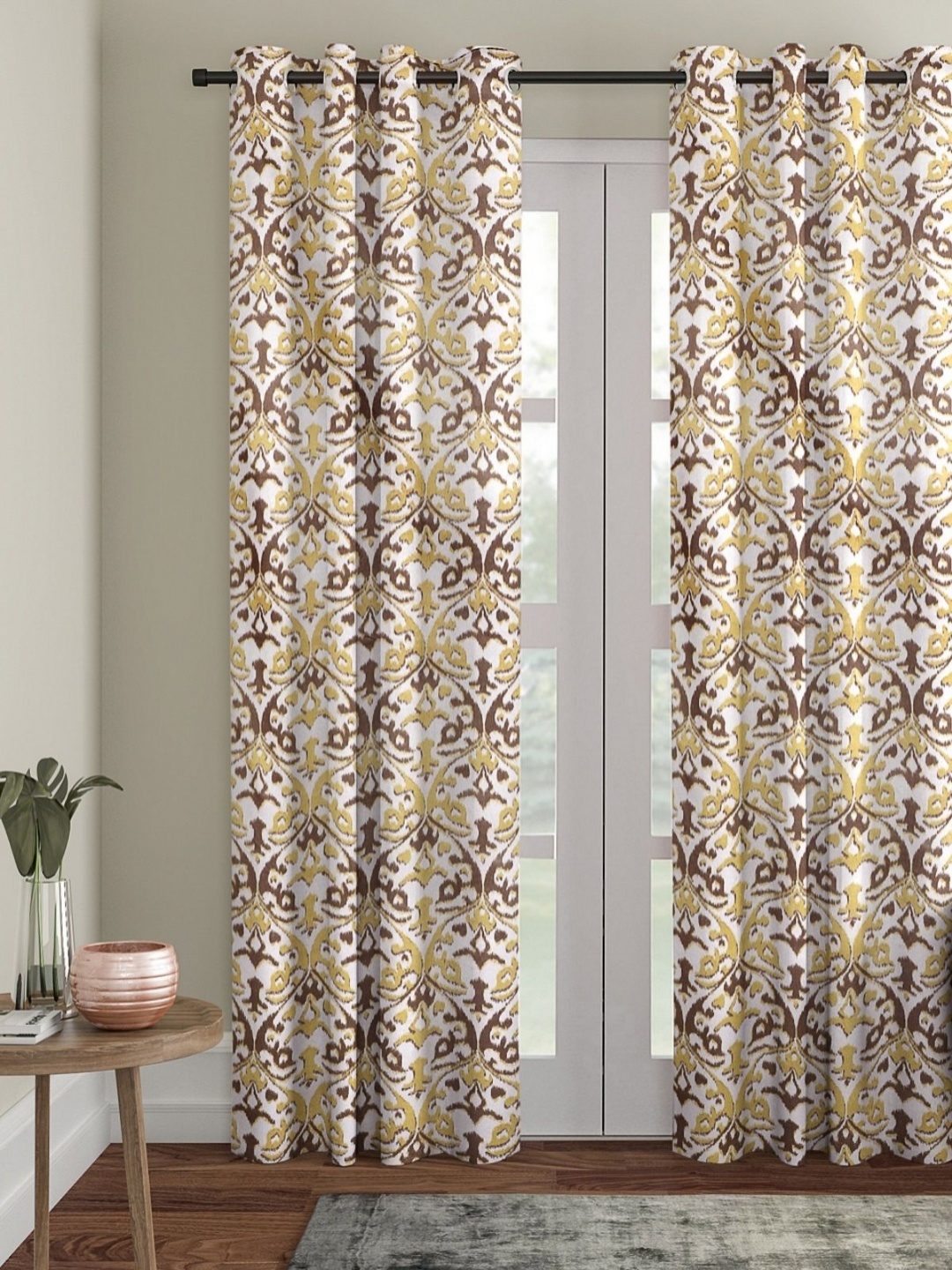 

Myntra Elegant Homes Yellow & White Set of 2 Ethnic Motifs Room Darkening Door Curtain