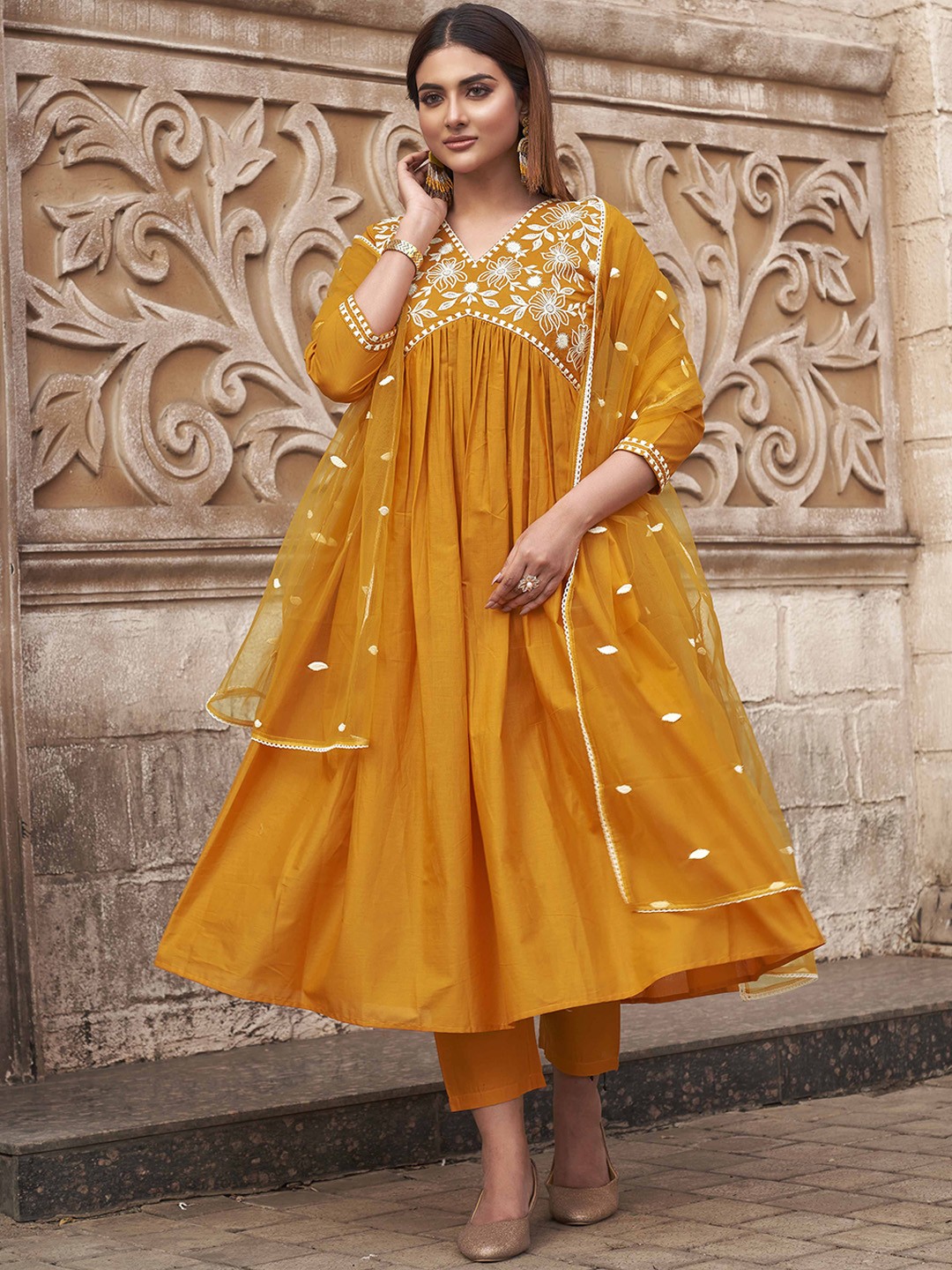 

Tikhi Imli Yellow Floral Embroidered Thread Work Cotton Kurta With Trousers & Dupatta