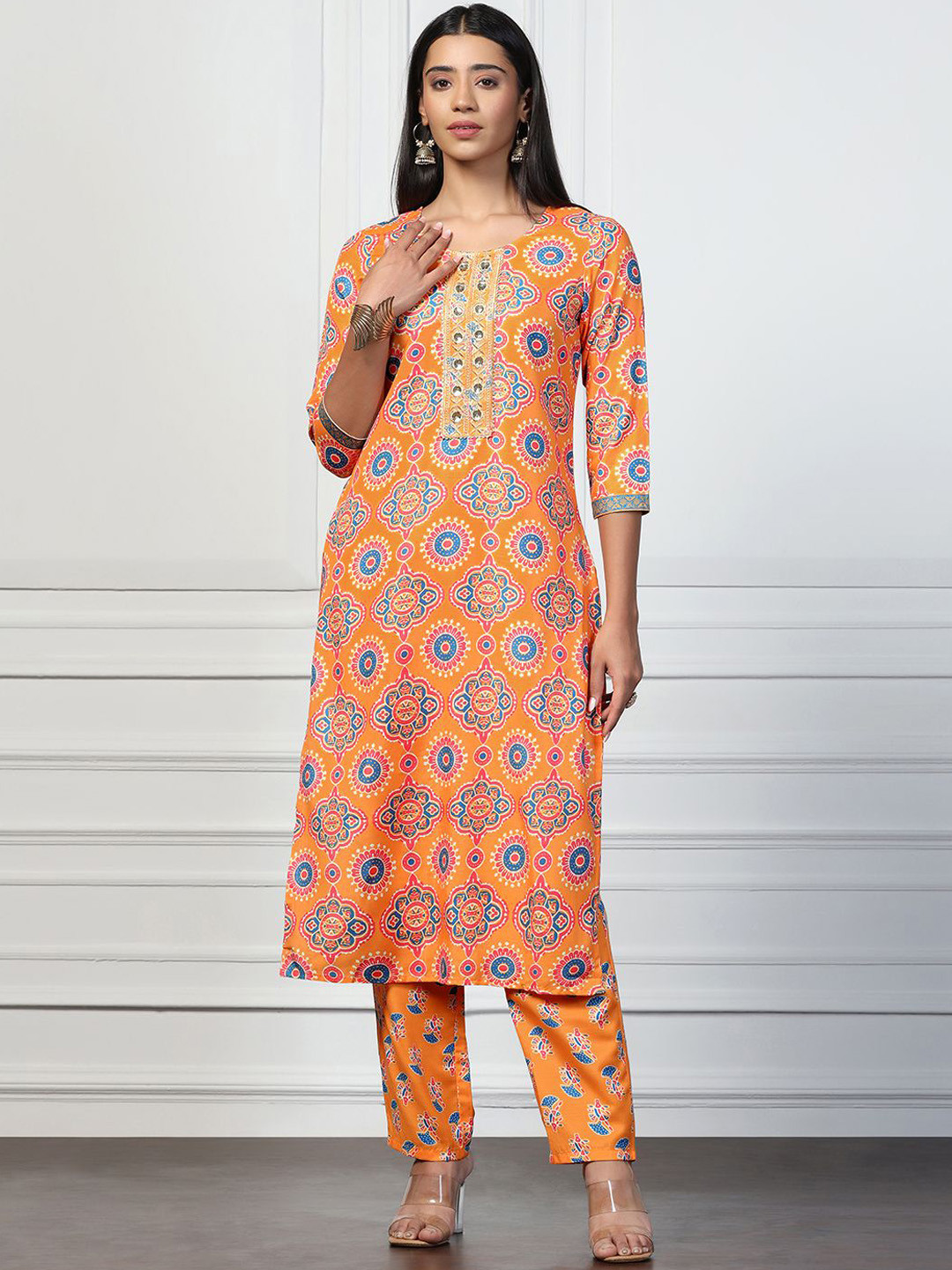 

Moda Rapido Women Floral Printed Regular Kurta with Trousers, Orange
