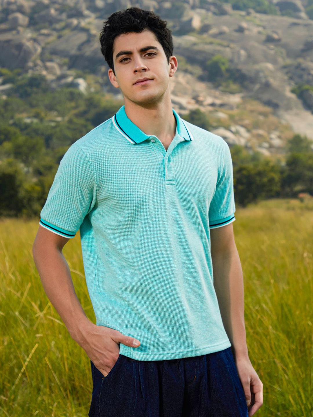 

Campus Sutra Men Solid Polo Collar Cotton T-shirt, Turquoise blue