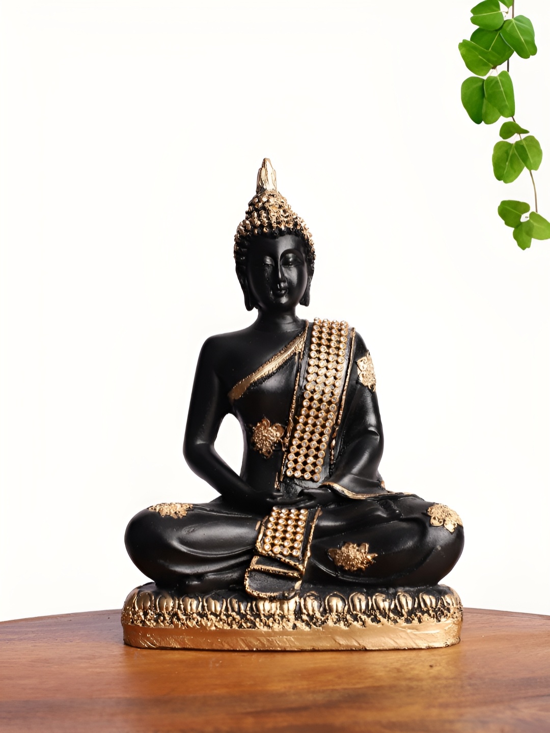 

INTERNATIONAL GIFT Black And Gold Toned Buddha Idol Showpiece