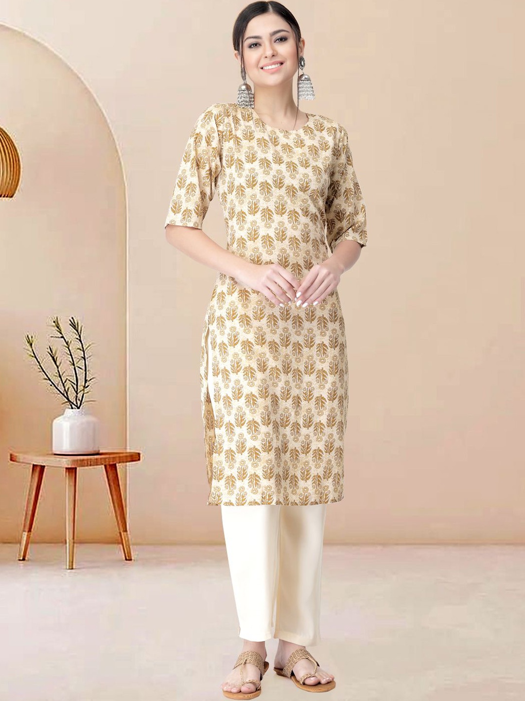 

Moda Rapido Women Ethnic Motifs Printed Regular Kurta with Trousers, Beige