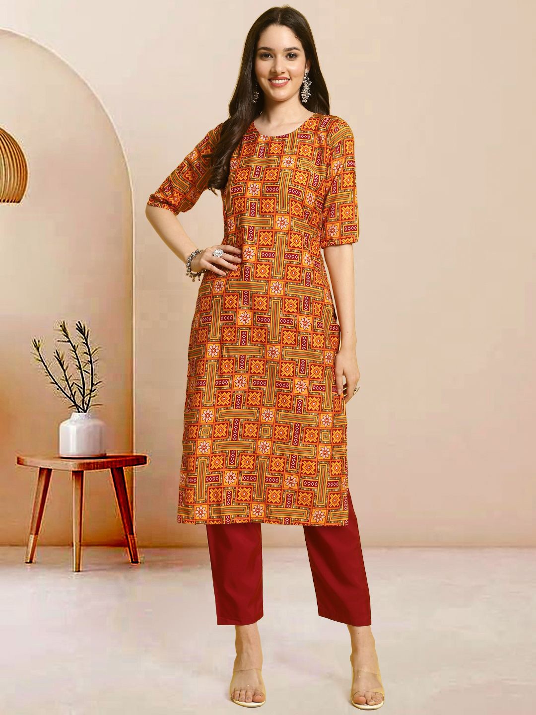 

Moda Rapido Ethnic Motifs Printed Round Neck Straight Kurta With Trousers, Yellow