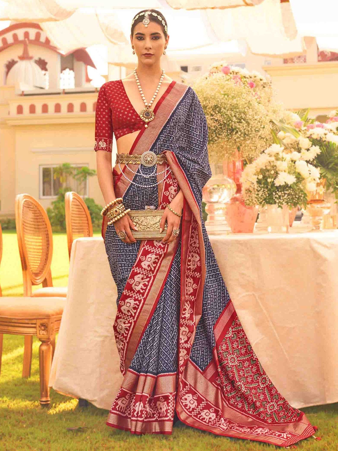 

Blissta Ethnic Motifs Zari Silk Blend Patola Saree, Navy blue