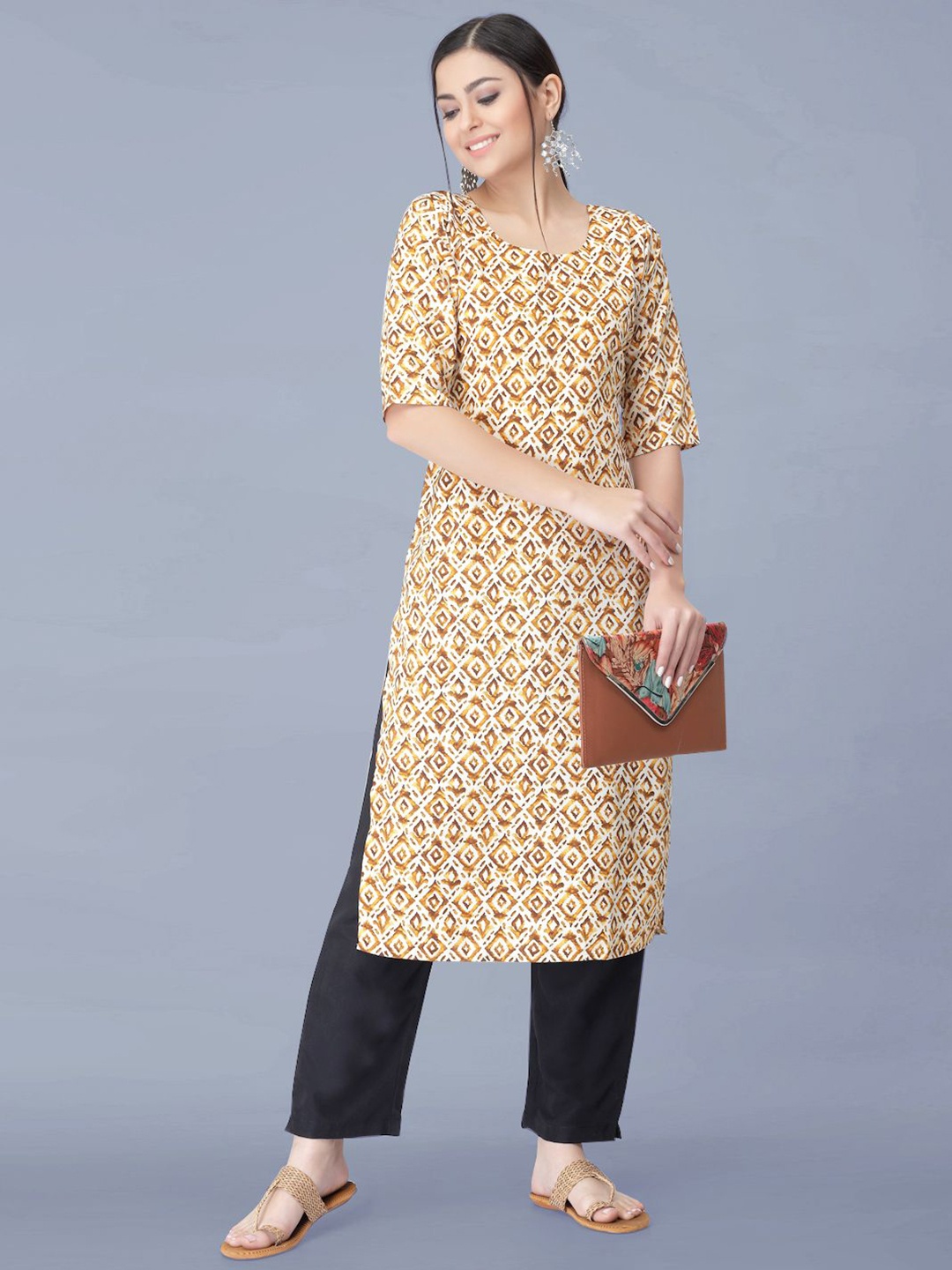

Moda Rapido Ethnic Motifs Printed Round Neck Straight Kurta With Trousers, Yellow