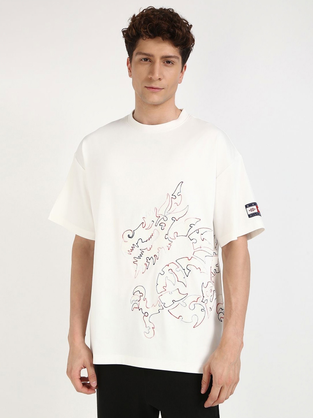 

Tommy Hilfiger Men Graphic Printed Round Neck Cotton Oversized T-shirt, White