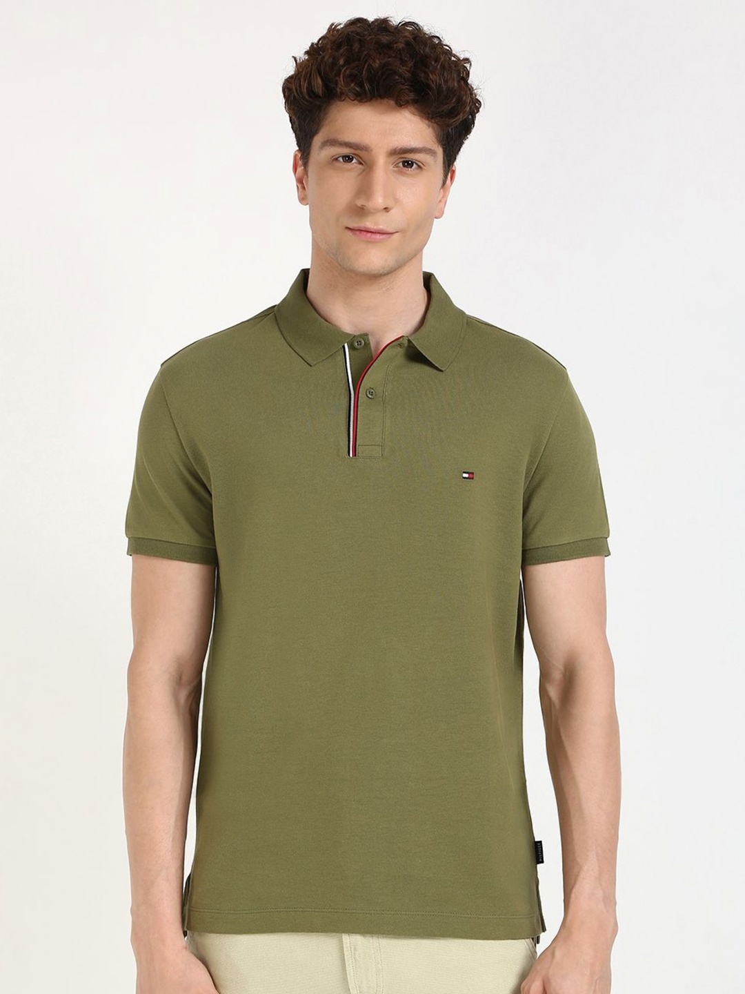 

Tommy Hilfiger Men Solid Polo Collar Cotton Slim Fit T-shirt, Olive
