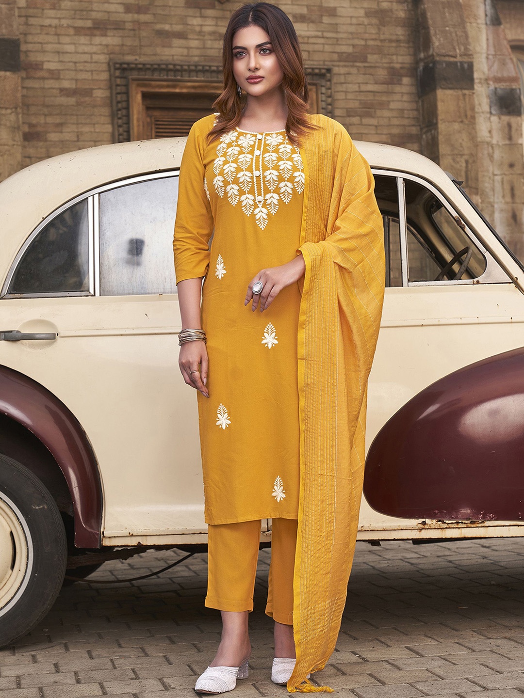 

Tikhi Imli Yellow Floral Embroidered Thread Work Straight Kurta With Trousers & Dupatta