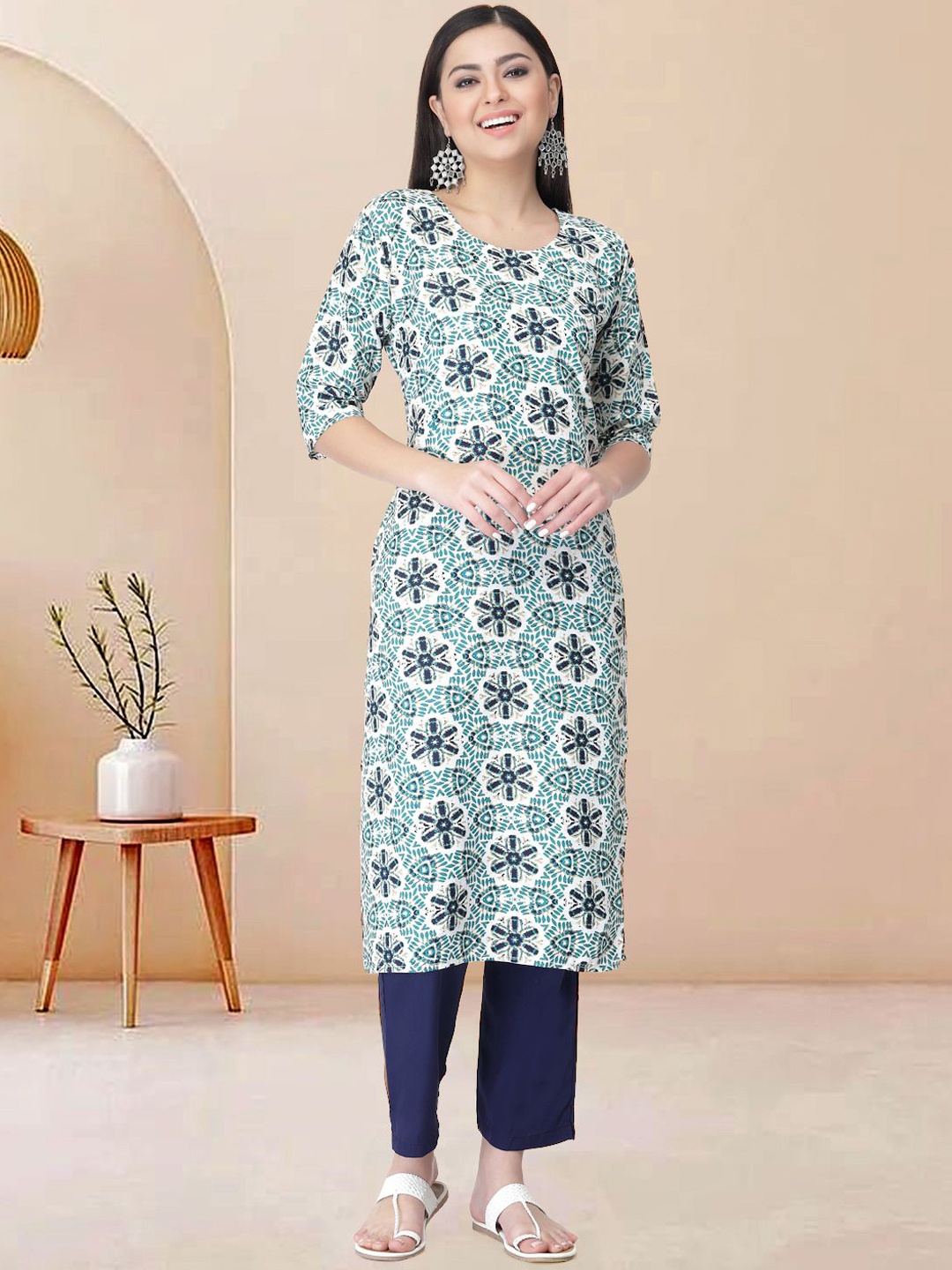 

Moda Rapido Floral Printed Round Neck Straight Kurta With Trousers, Green