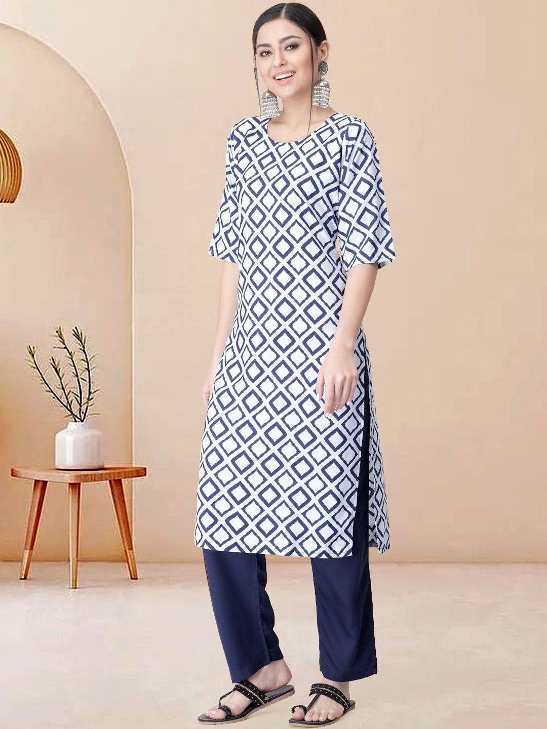 

Moda Rapido Women Ethnic Motifs Printed Regular Kurta with Trousers, White