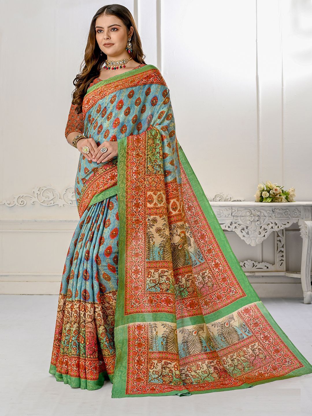 

Krimmple Women Ethnic Motifs Sequinned Pure Silk Saree, Blue
