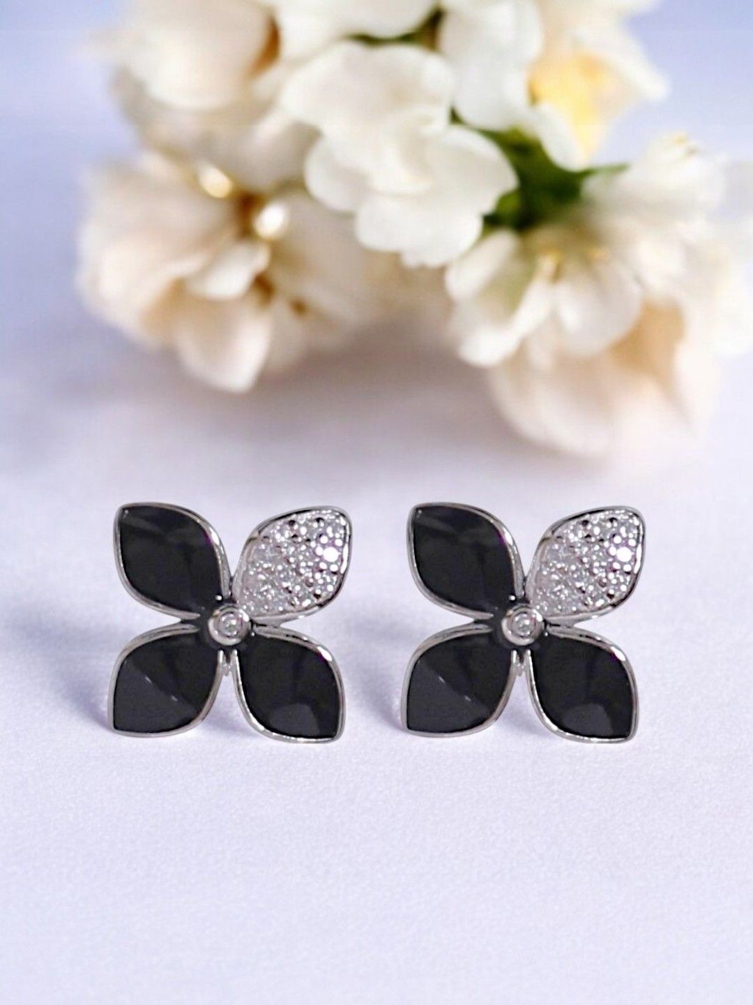 

Taraash 925 Sterling Silver-Plated Cubic Zirconia Studded Floral Shaped Studs