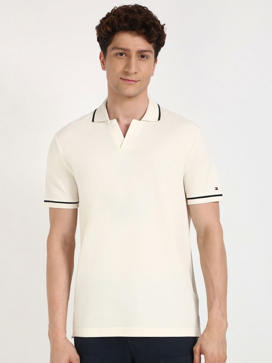 

Tommy Hilfiger Men Solid Polo Collar Cotton T-shirt, Off white