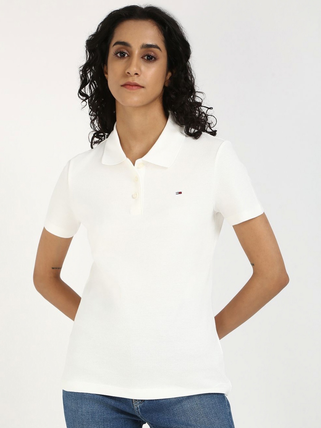 

Tommy Hilfiger Women Solid Polo Collar Cotton Slim Fit T-shirt, White