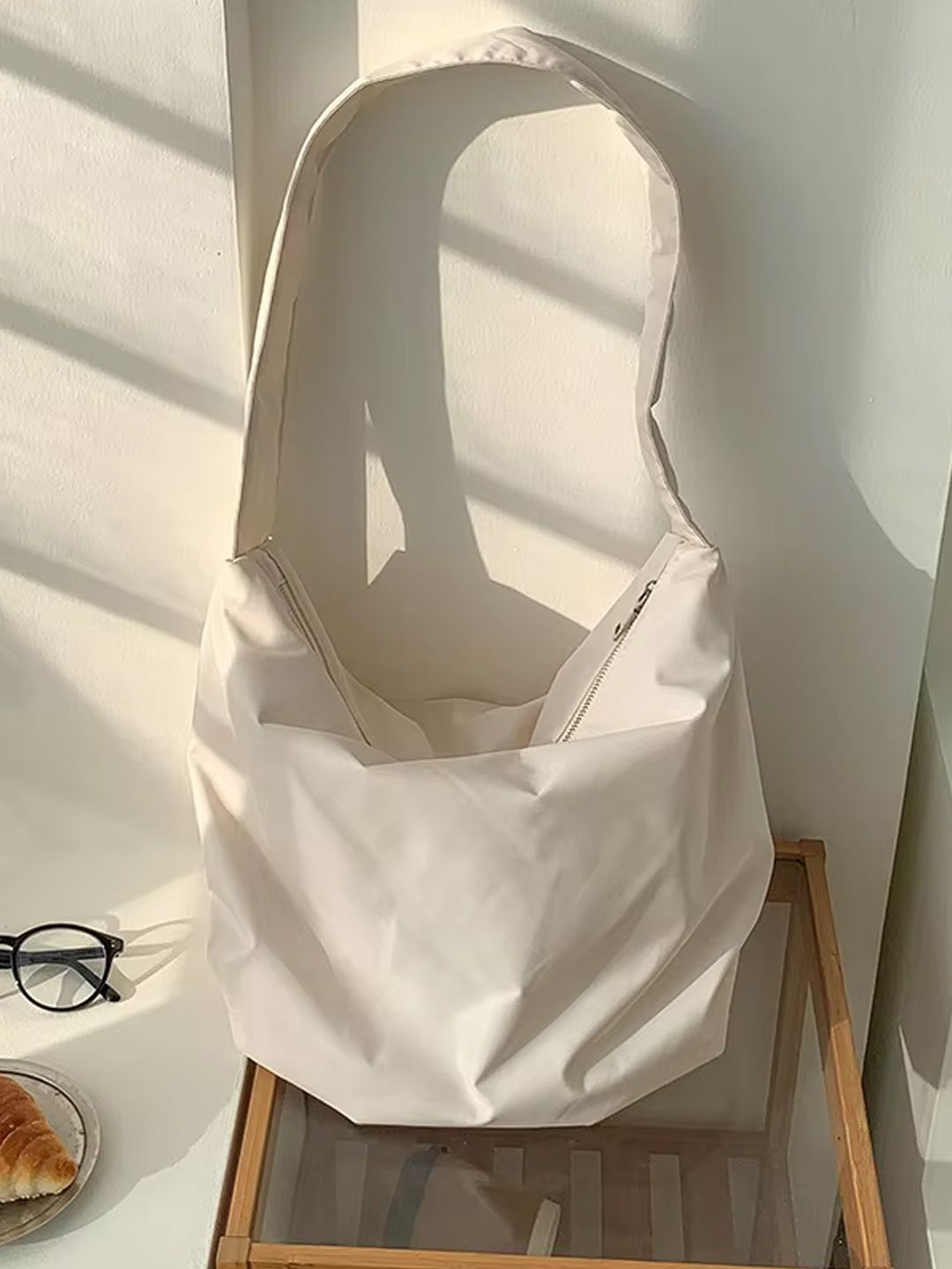 

StyleCast Textured Oversized Bucket Hobo Bag with Tasselled, White