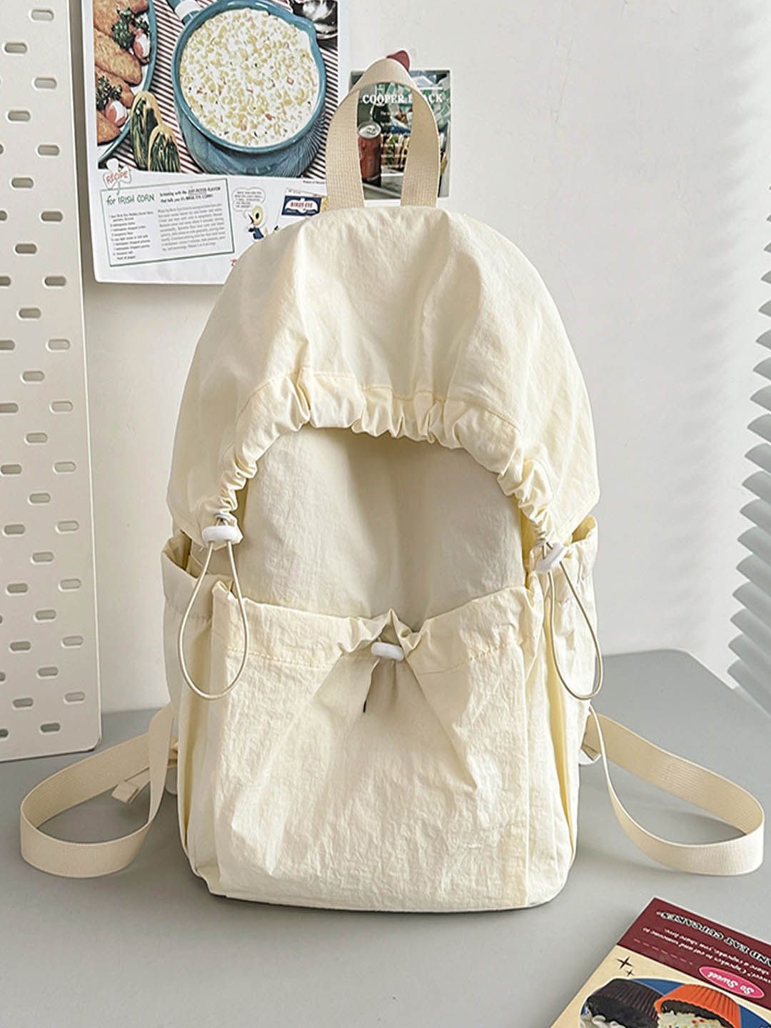 

StyleCast Bucket Handheld Bag with Tasselled, Off white