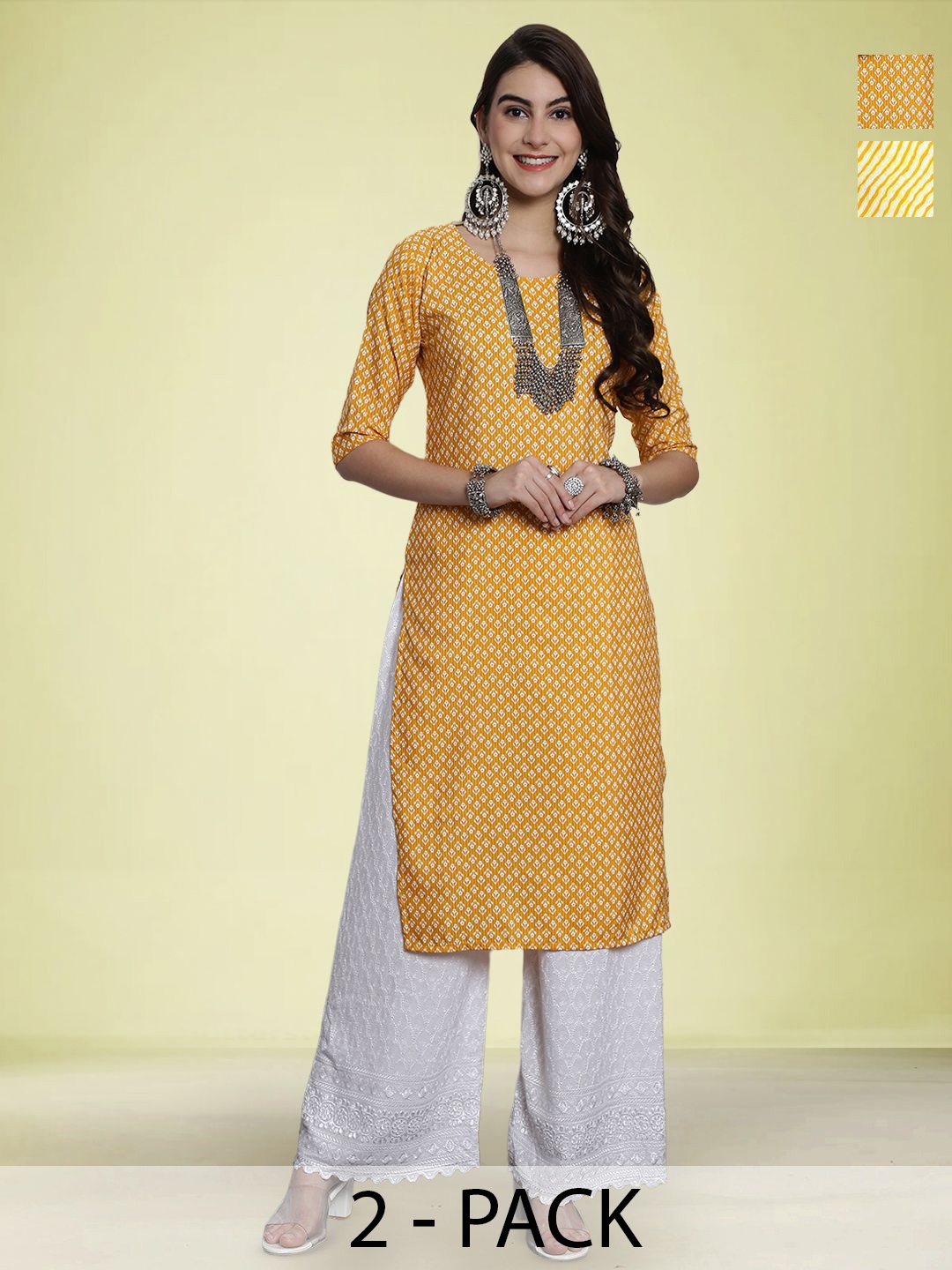 

Moda Rapido Selection Of 2 Floral Printed Round Neck Straight Kurtas, Mustard