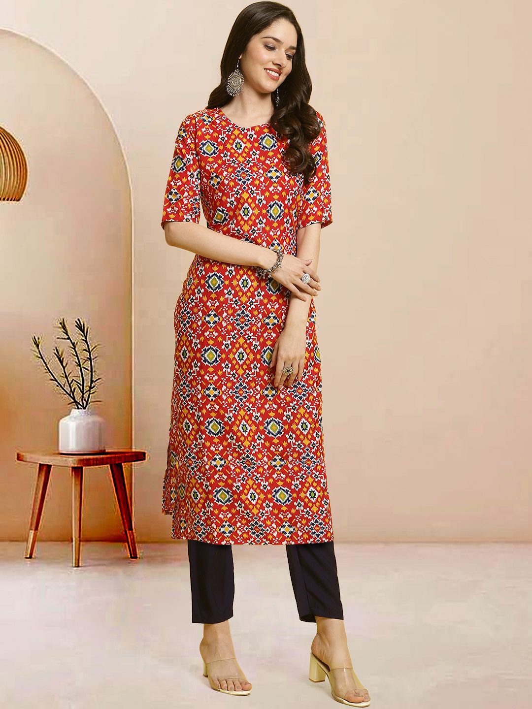 

Moda Rapido Women Ethnic Motifs Printed Regular Kurta with Trousers, Red