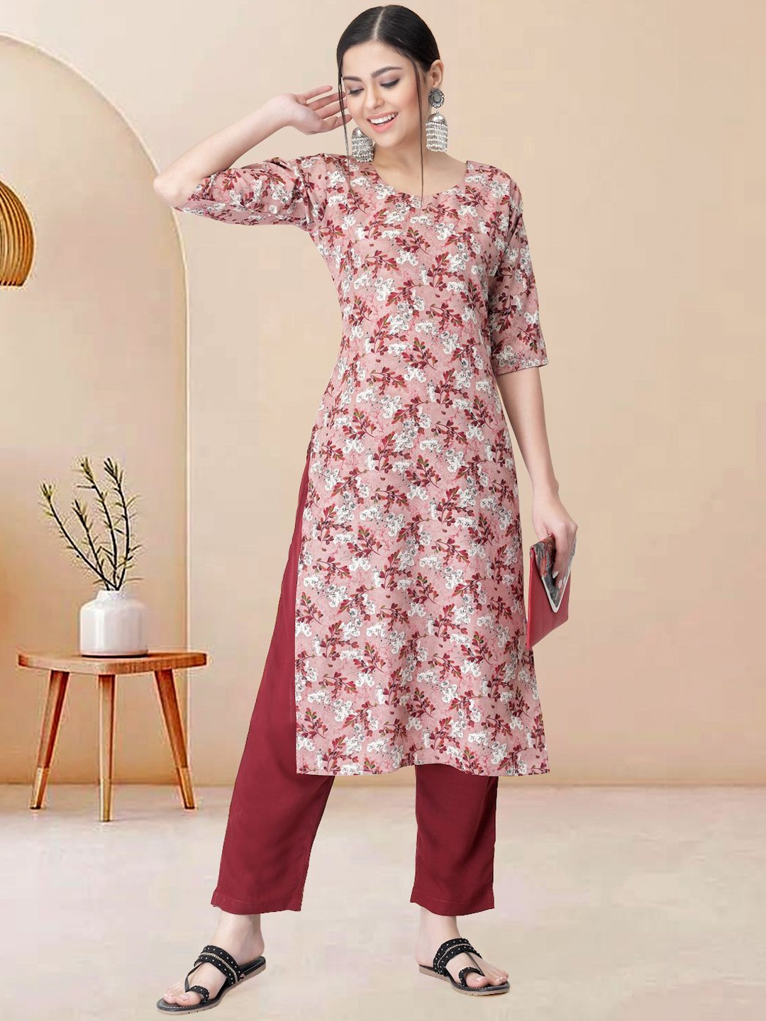 

Moda Rapido Women Floral Printed Regular Kurta with Trousers, Peach