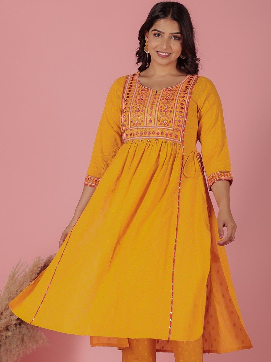 

Aramya Floral Embroidered Notch Neck Pleated Thread Work Cotton A-Line Kurta, Yellow