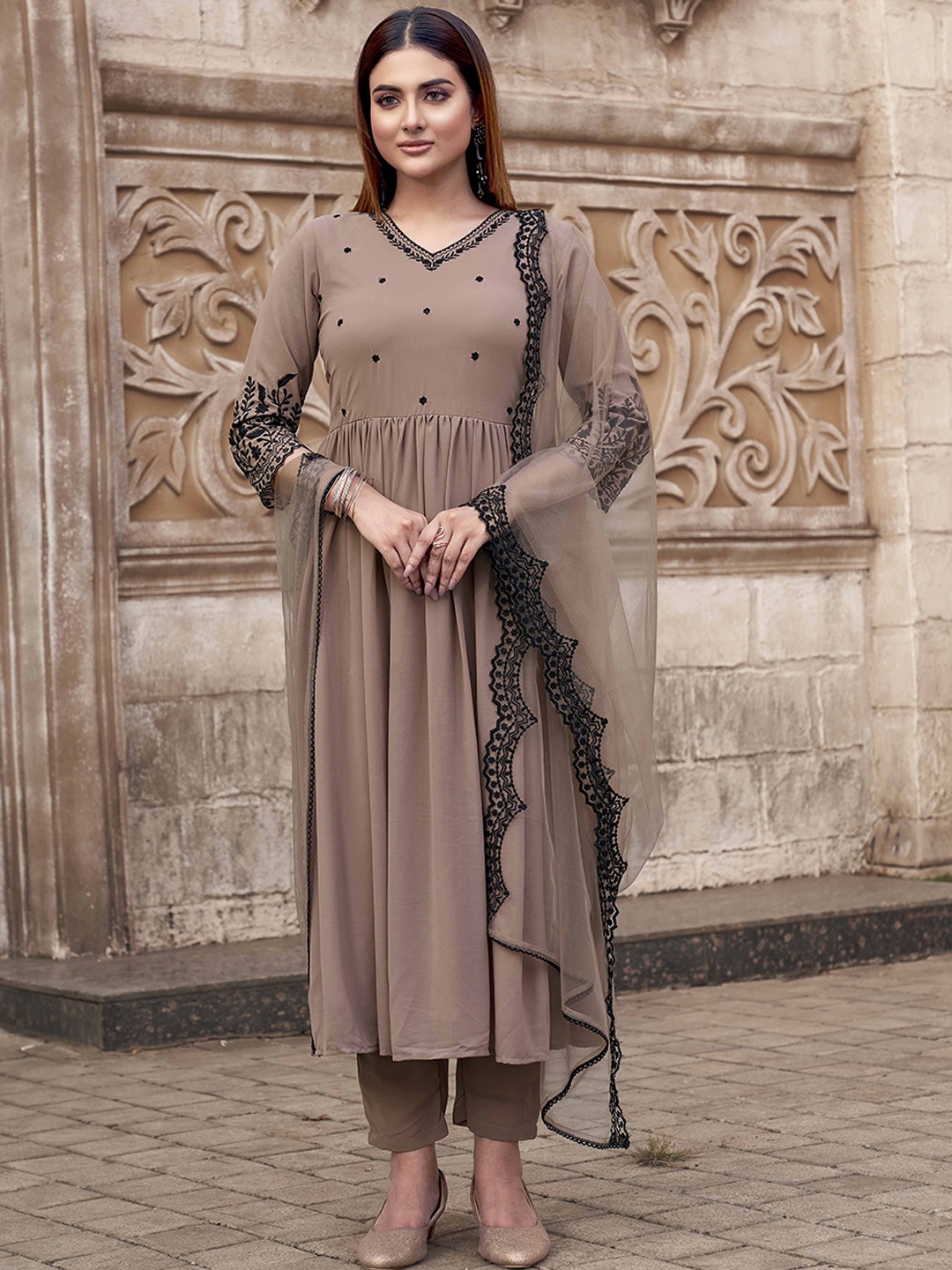 

Tikhi Imli Nude Floral Embroidered Thread Work Georgette Kurta With Trouser & Dupatta