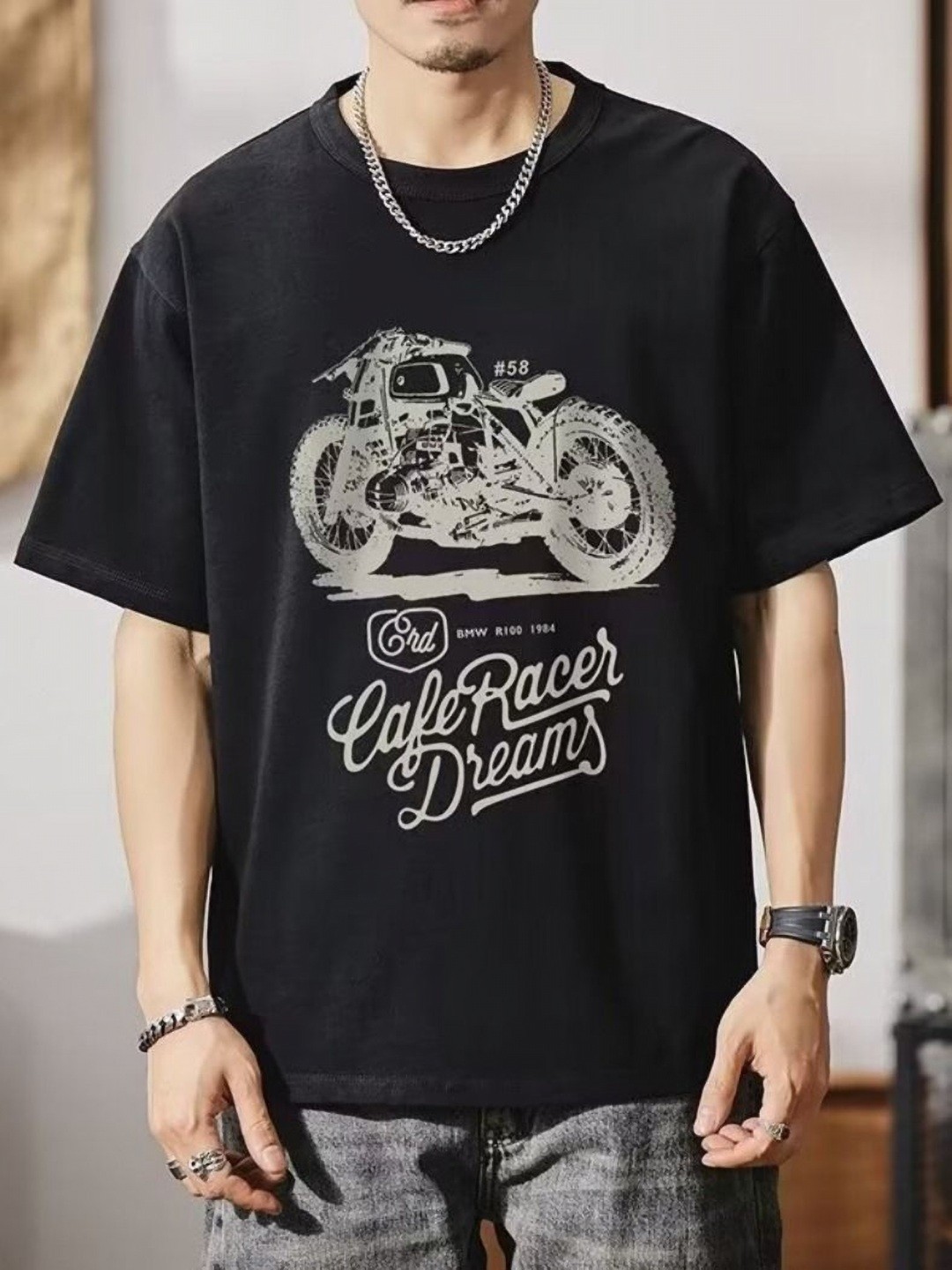 

StyleCast Men Graphic Printed Round Neck Silk Oversized T-shirt, Black