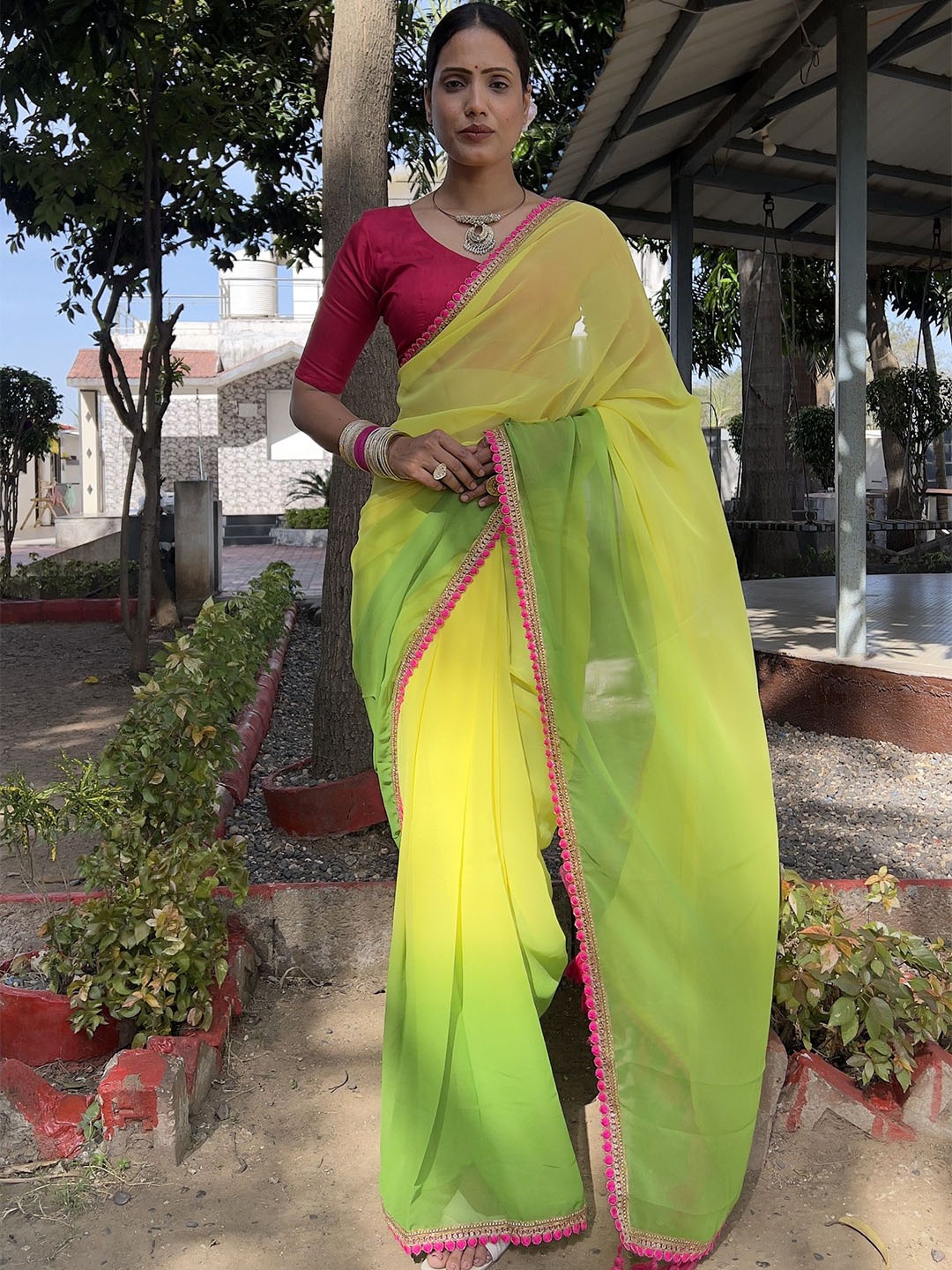 

LADY SHOPI Colourblocked Embroidered Pure Georgette Saree, Green