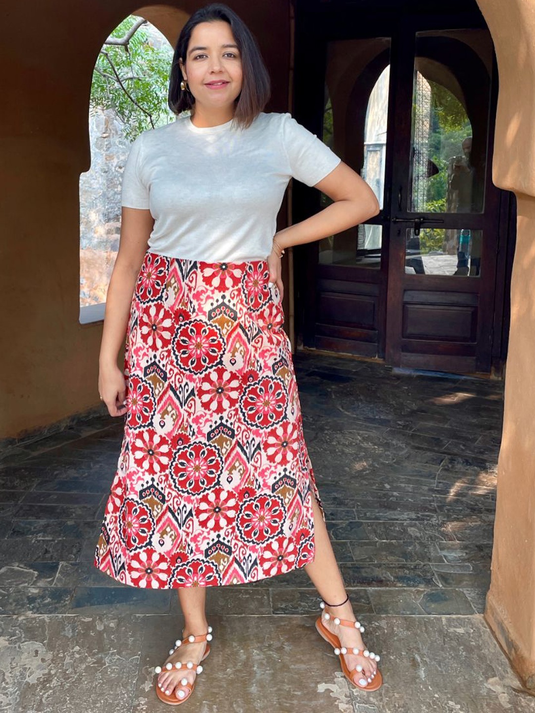 

Label Tanvee Women Printed Pure Cotton A-Line Midi Skirt, Maroon