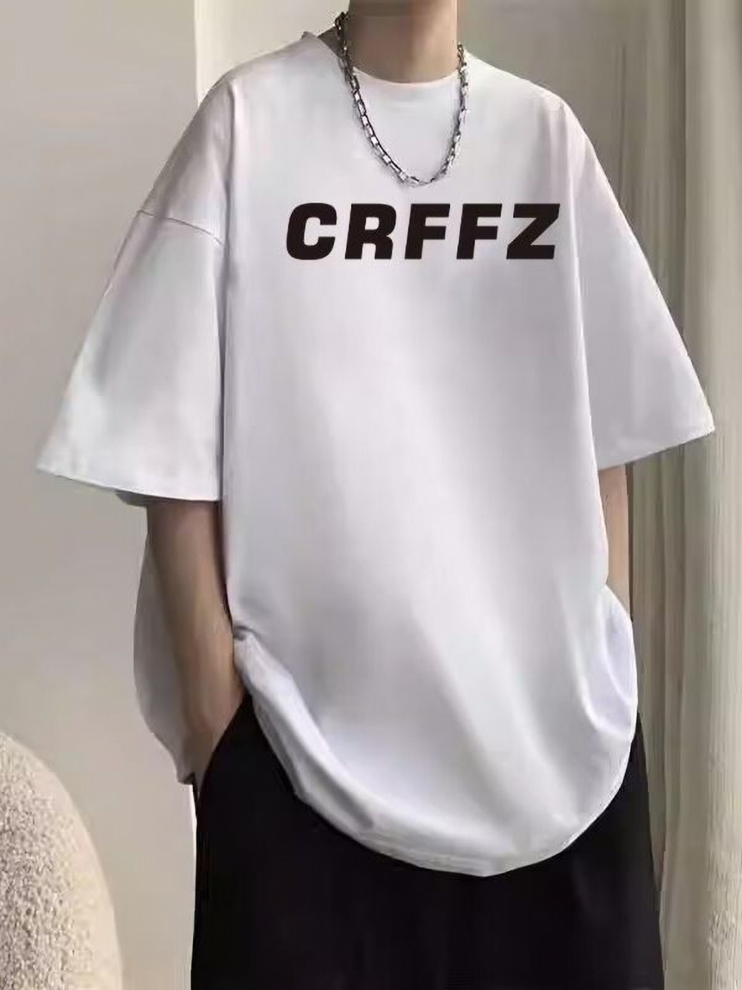 

StyleCast Men Typography Printed Round Neck Silk Oversized T-shirt, White