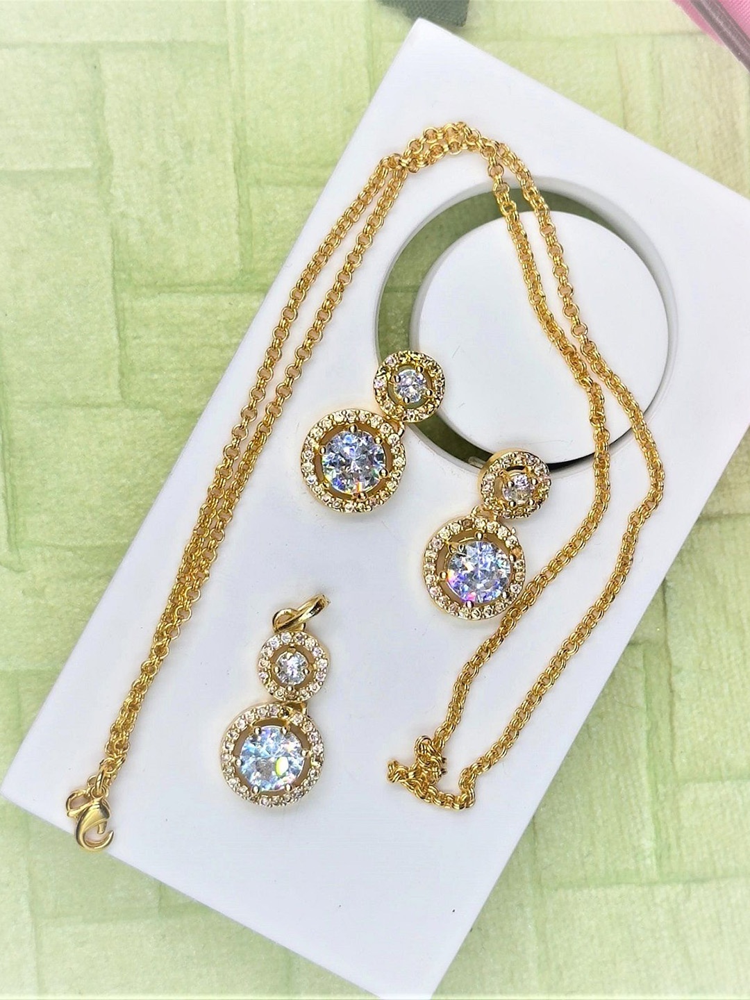 

AKLINA Gold Plated Cubic Zirconia Stone Studded Pendant and Earrings