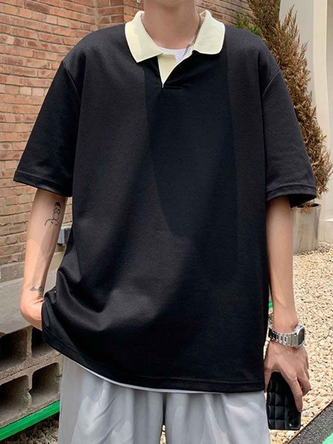 

StyleCast Men Solid Polo Collar Oversized T-shirt, Black