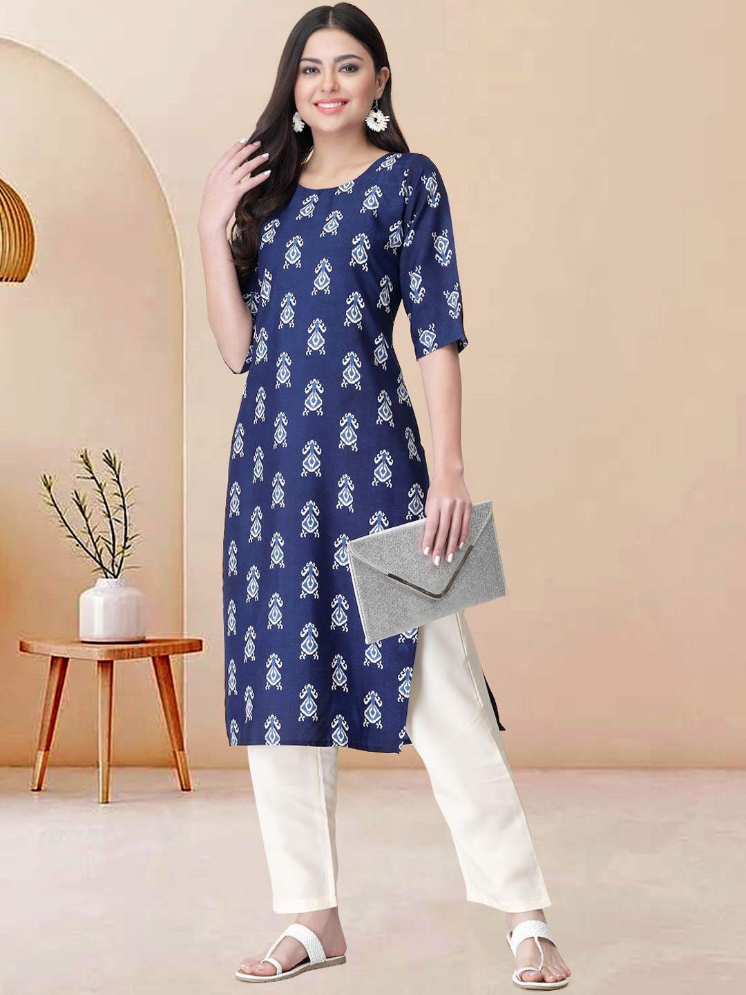 

Moda Rapido Women Ethnic Motifs Printed Regular Kurta with Trousers, Blue