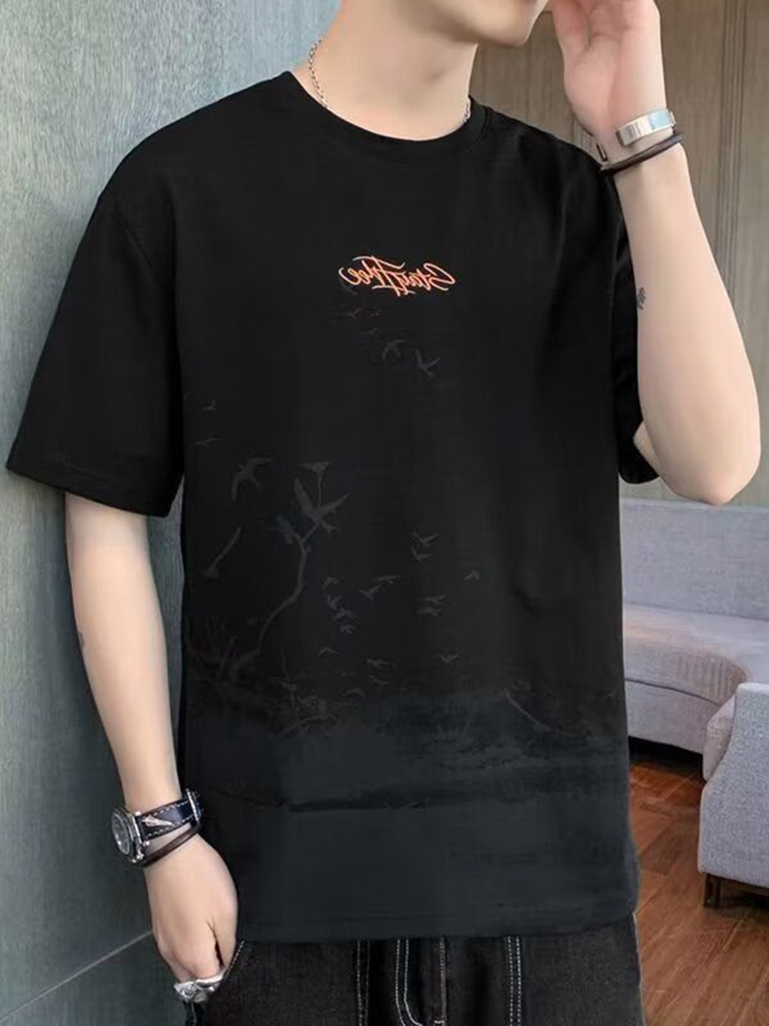 

StyleCast Men Graphic Printed Round Neck Silk Oversized T-shirt, Black