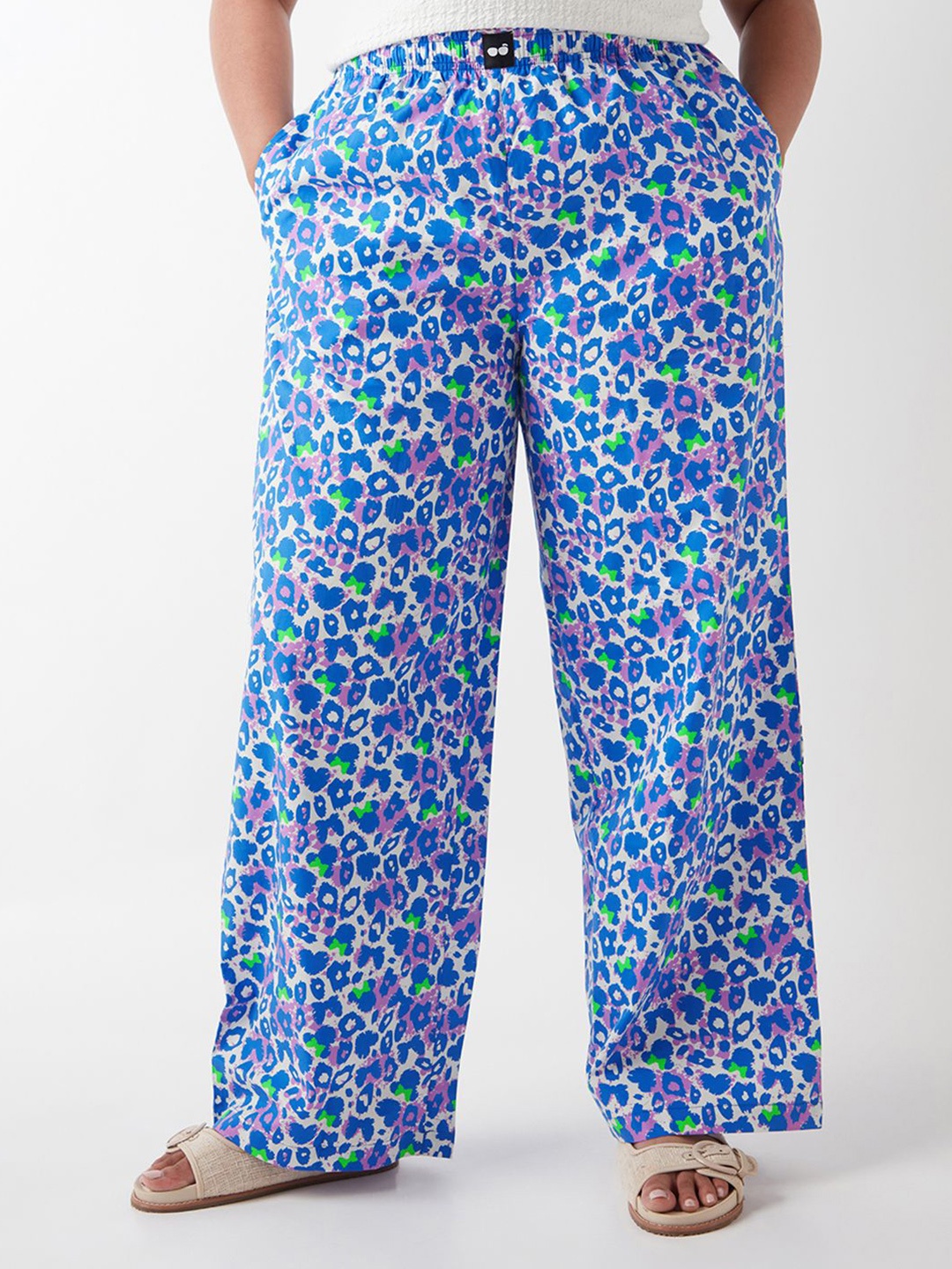

Bewakoof Women's Purple All Over Printed Plus Size Wide Leg Lounge Pants