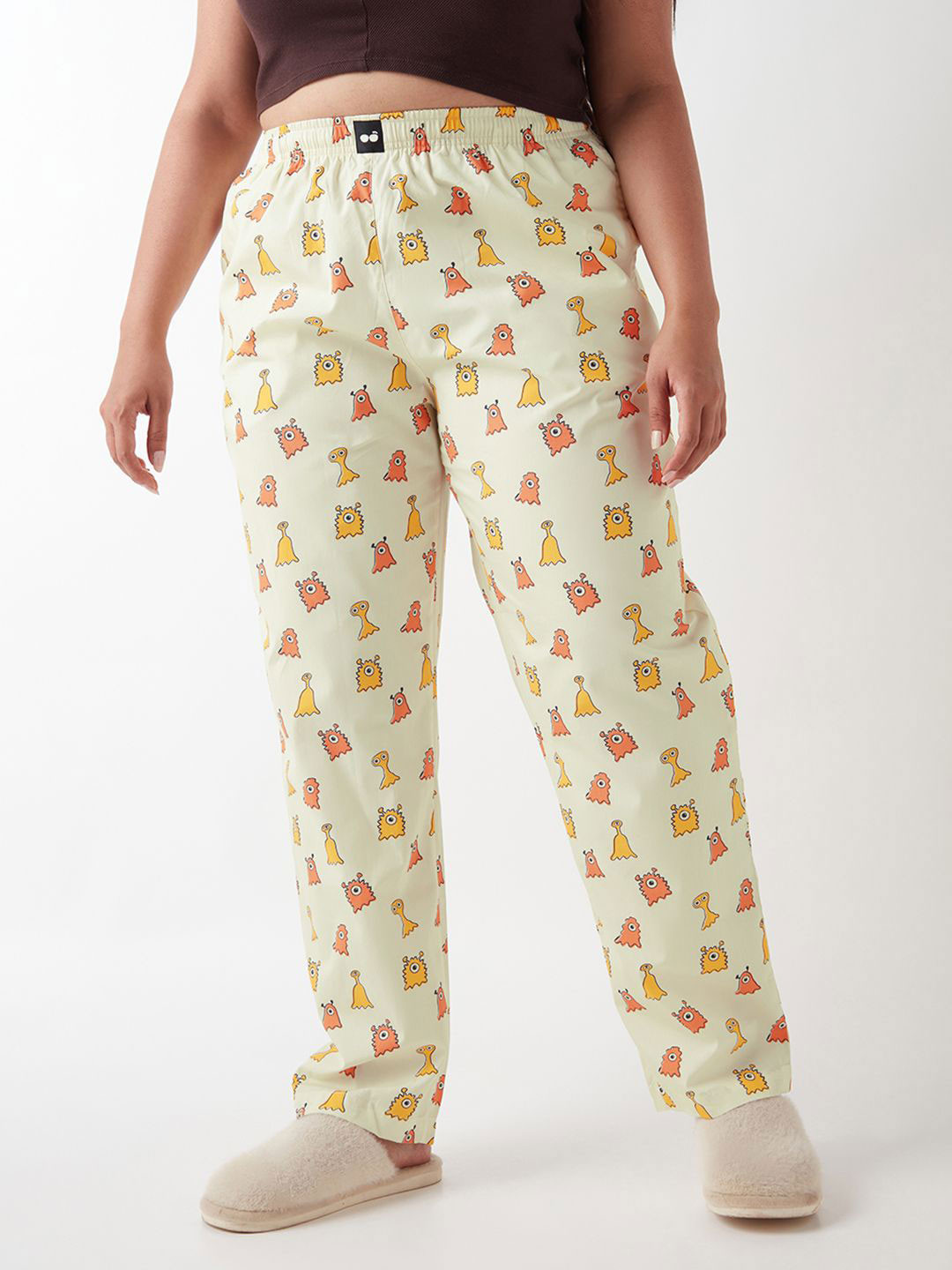 

Bewakoof Plus Women's Yellow All Over Printed Plus Size Lounge Pants, Cream