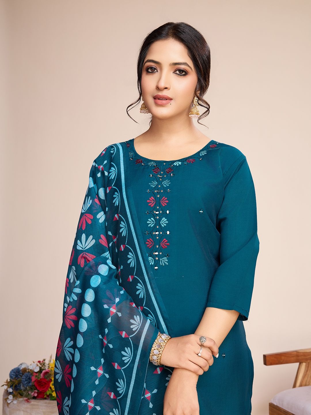 

Divyadham Textiles Thread Work Round Neck Straight Kurta With Trouser And Dupatta, Turquoise blue