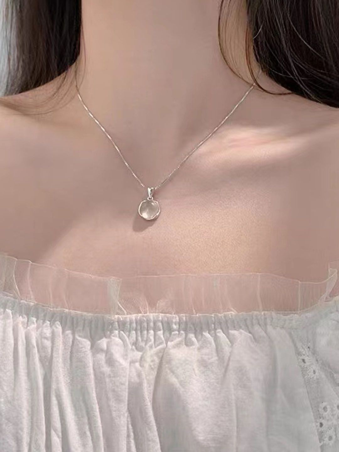 

StyleCast Elegant Silver-Toned Stone Studded Circular Shaped Pendant With Chain