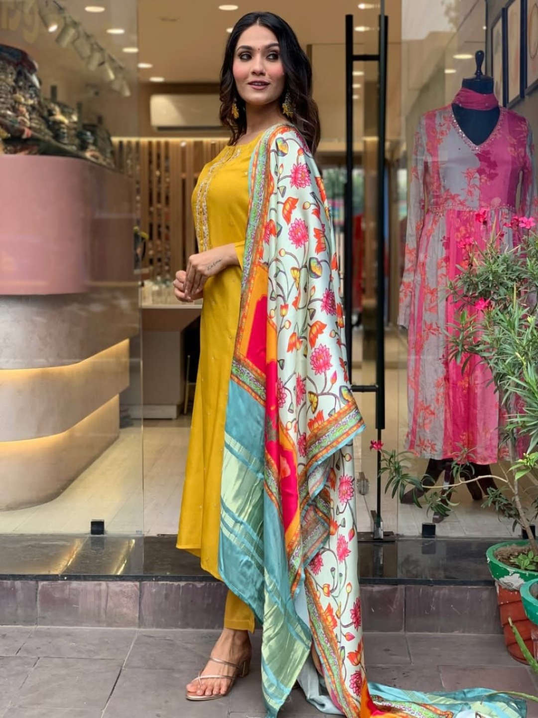 

KALINI Thread Work Embellished Round Neck Straight Kurta with Trousers And Dupatta, Mustard