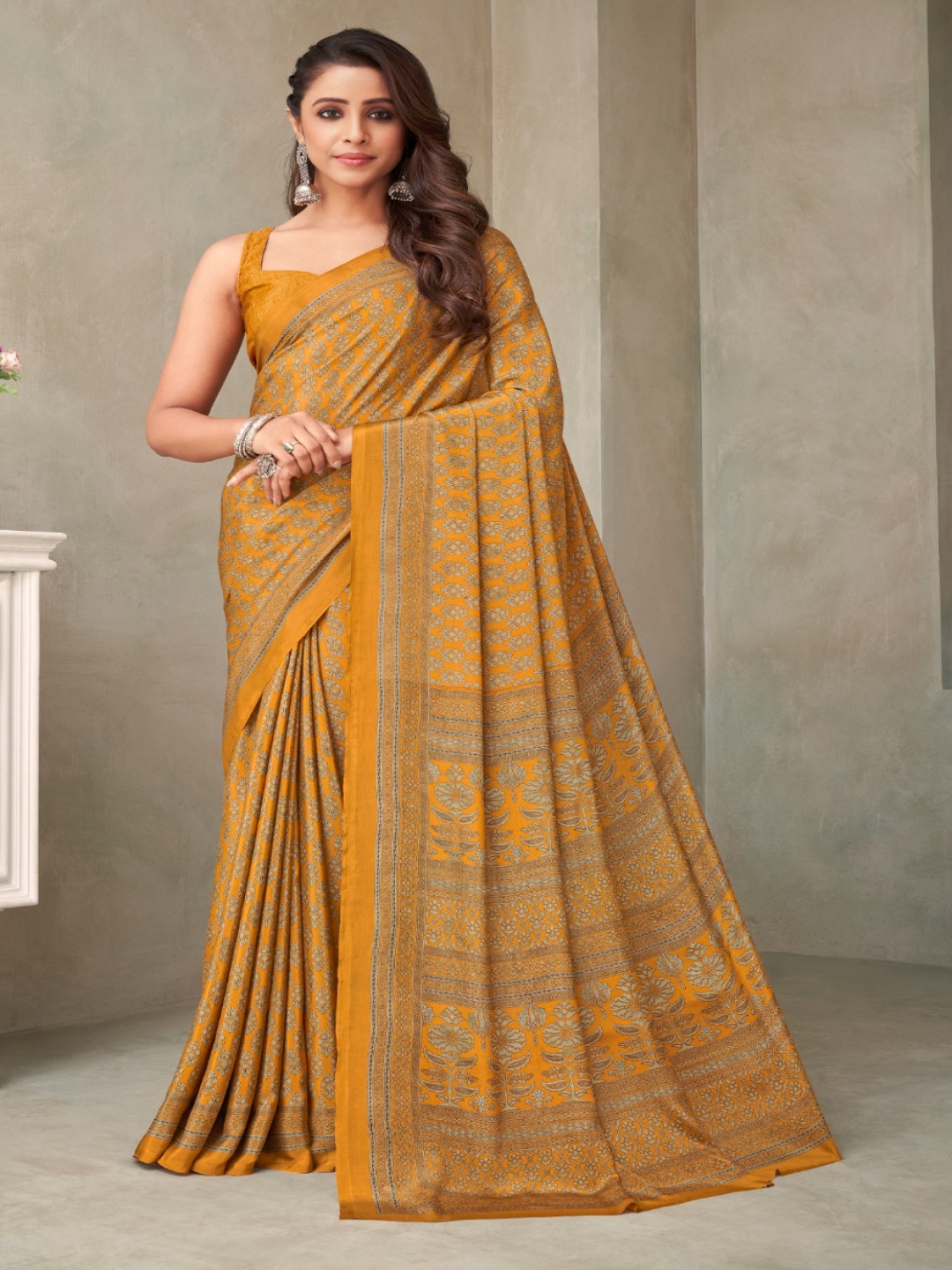 

Reboot Fashions Floral Pure Crepe Saree, Mustard