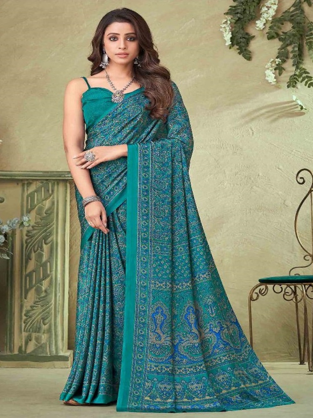 

Reboot Fashions Floral Pure Crepe Saree, Teal