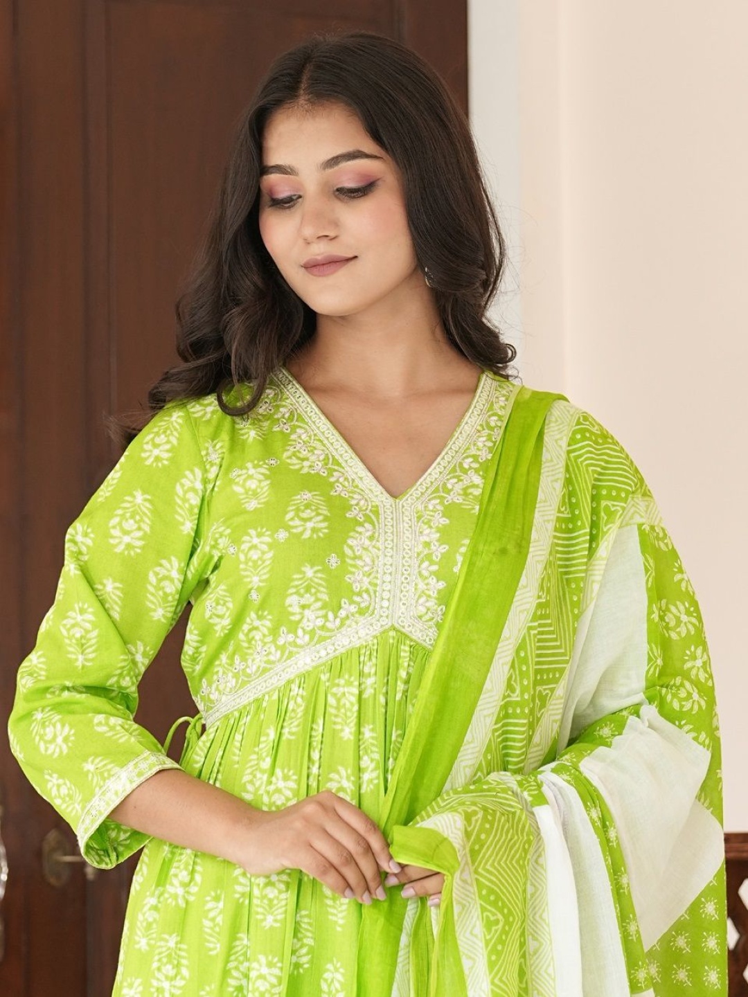 

ANNAYEMA APPARELS Floral Printed Sequinned Empire Anarkali Kurti With Trouser And Dupatta, Green