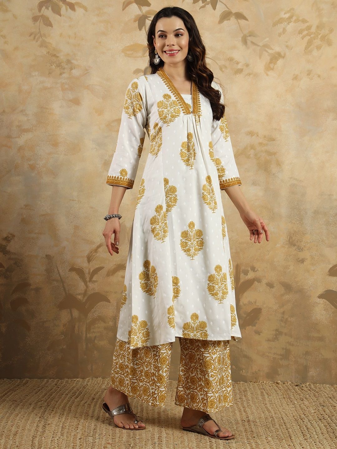 

KALINI Floral Printed Thread Work V Neck Pure Cotton Kurta With Trousers & Dupatta, Mustard