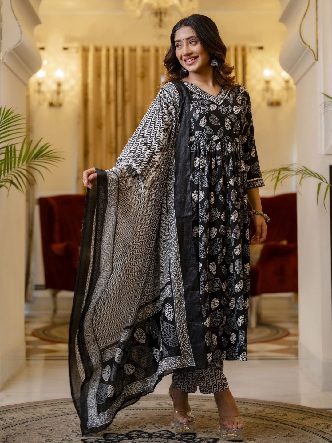 

Lookmark Black Ethnic Motifs Printed Kurta with Trousers & Dupatta