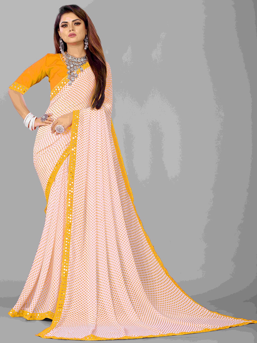 

Flip The Style Yellow & White Tussar Sequinned Polka Dot Pure Georgette Saree