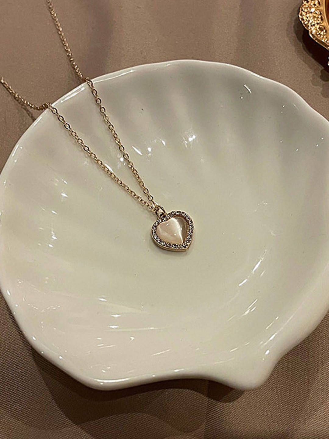 

StyleCast Gold-Toned Heart Shaped Elegant Pendant With Chain