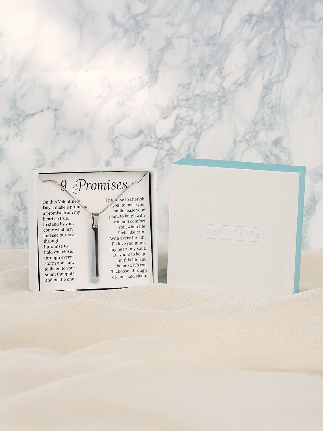

Mesmerize Silver Slimtag Necklace with 9 promises card