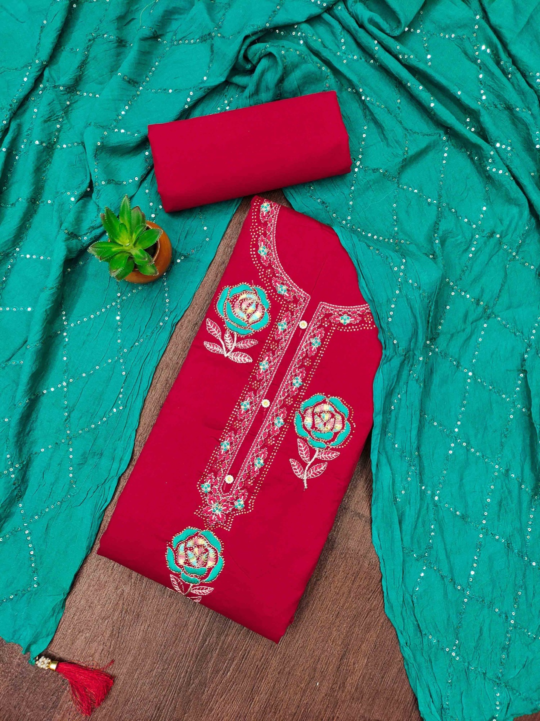 

Maroosh Floral Embroidered Diamond Jaam Cotton Unstitched Dress Material, Red