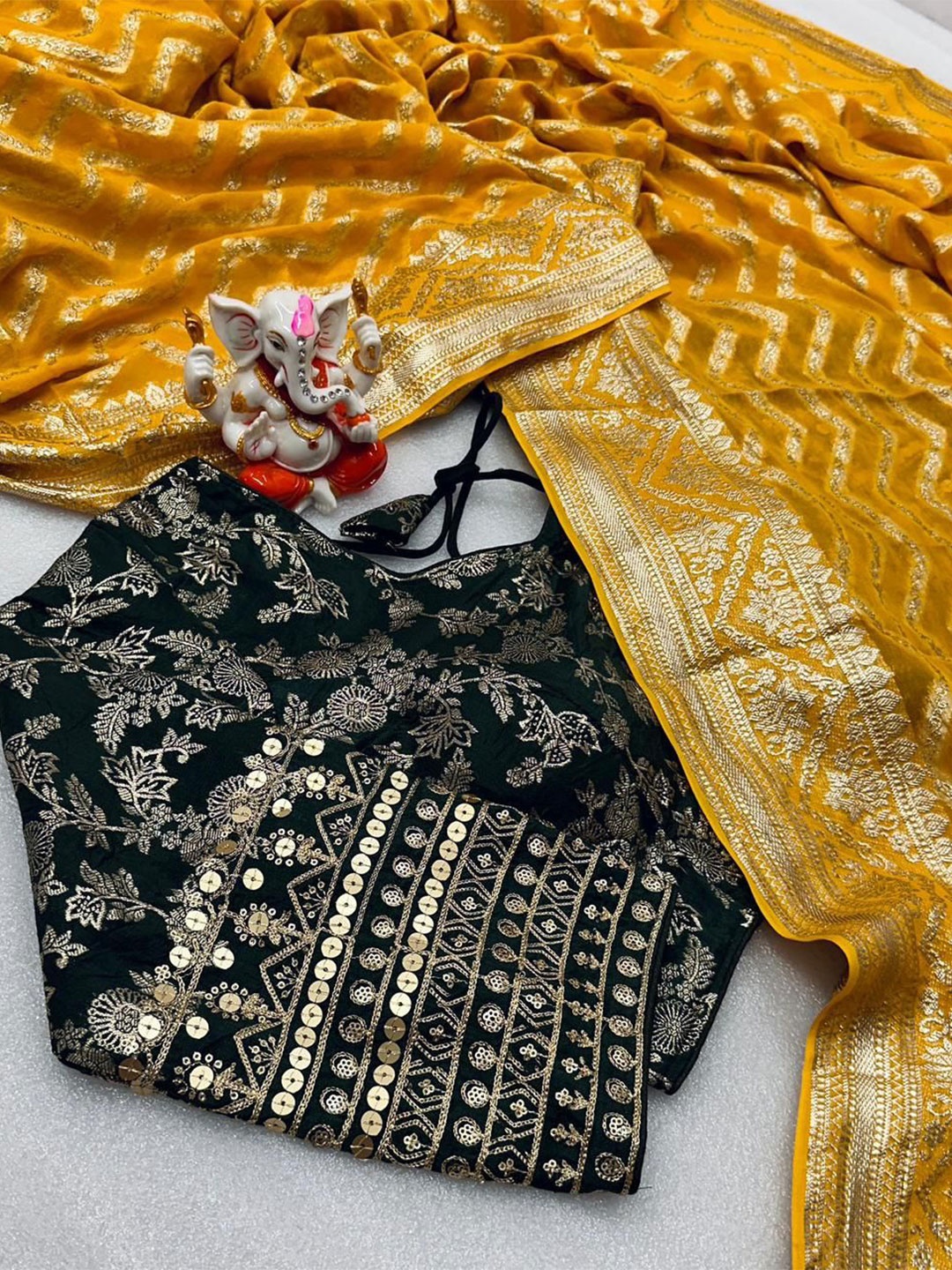 

PAYAL CREATION Striped Zari Pure Georgette Saree, Yellow