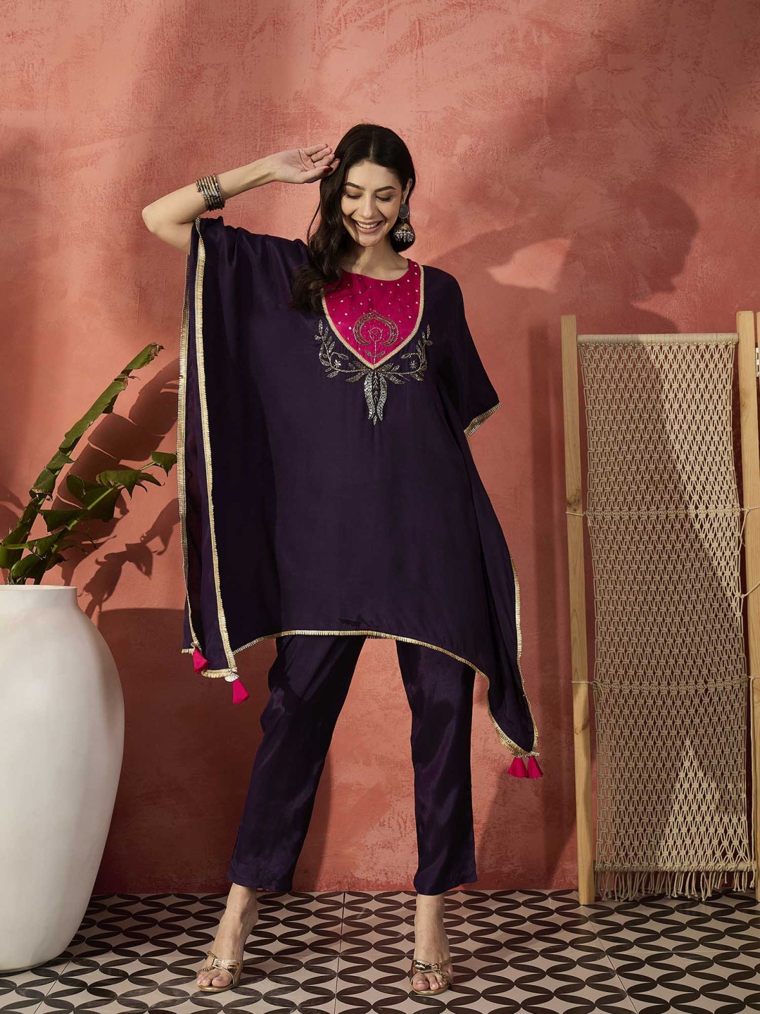 

Sangria Burgundy Yoke Design Beads And Stones Round Neck Kaftan Kurta With Trousers