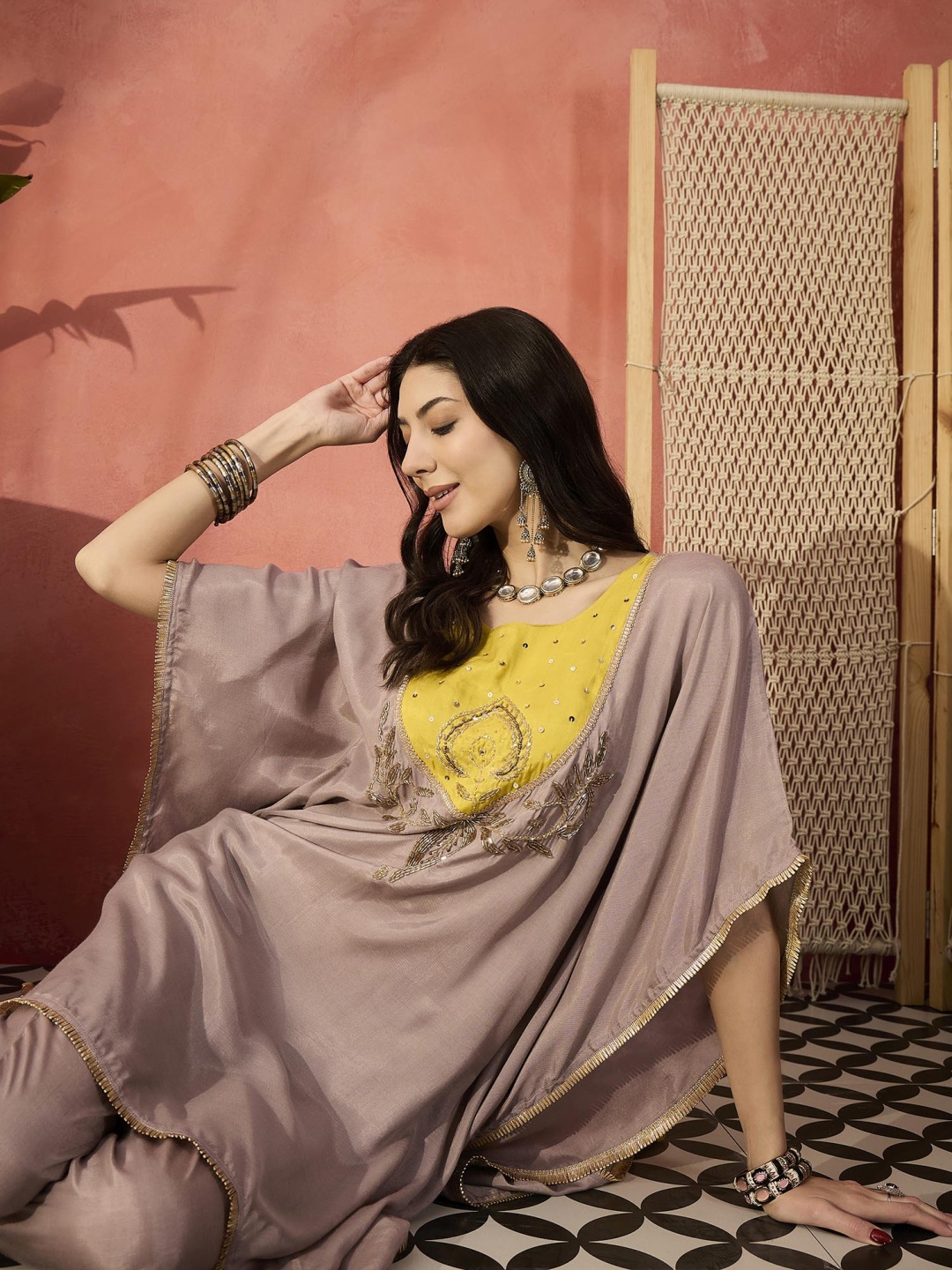 

Sangria Beige Yoke Design Beads And Stones Round Neck Kaftan Kurta With Trousers